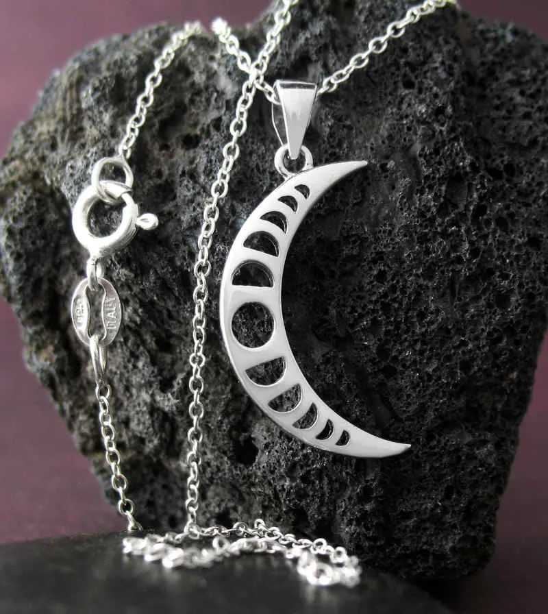 Crescent Moon With Cut-Out Moon Phases Pendant