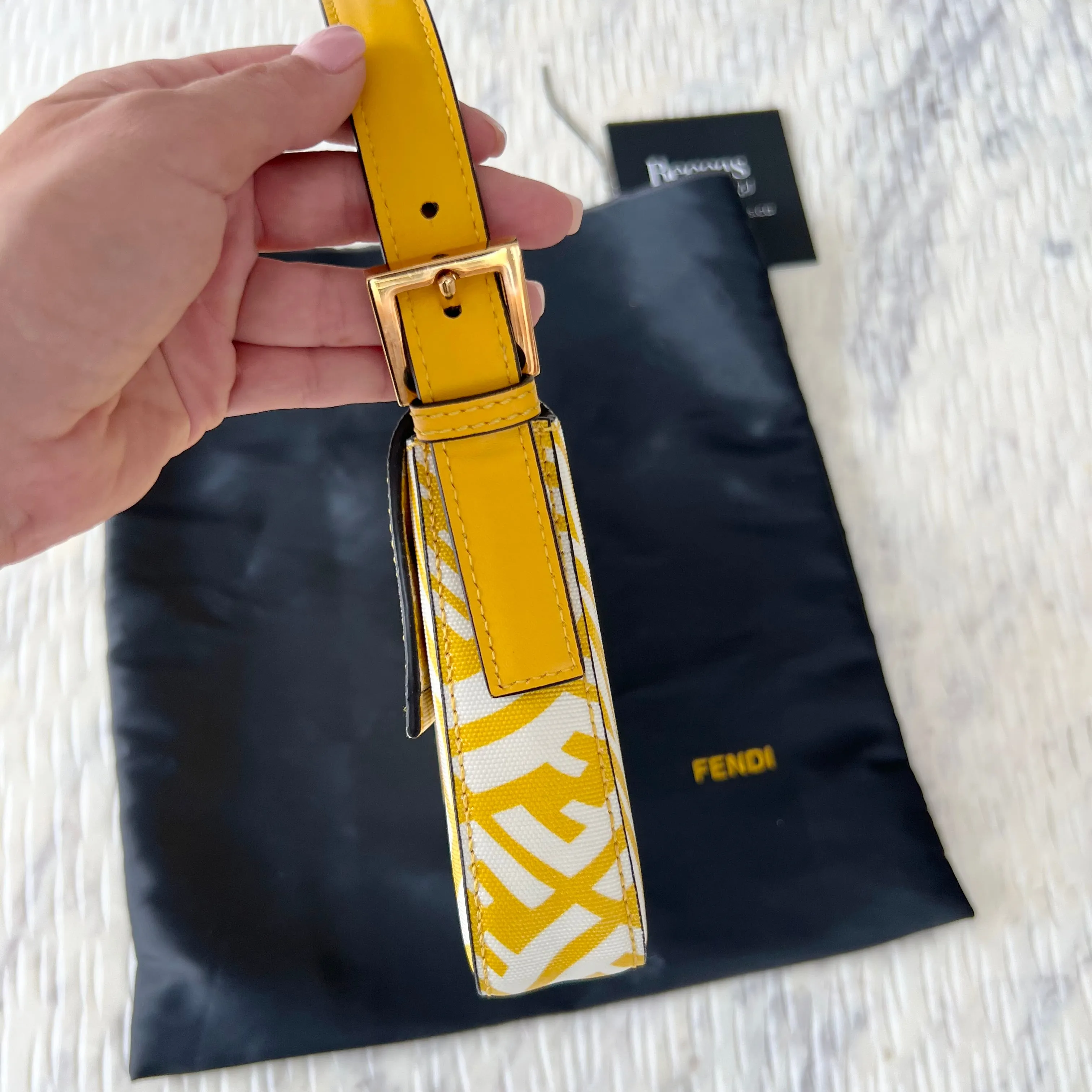 Sure, a more optimized title for this e-commerce product could be: FENDI x Sarah Coleman FF Vertigo Baguette Bag - Stylish Limited Edition Design