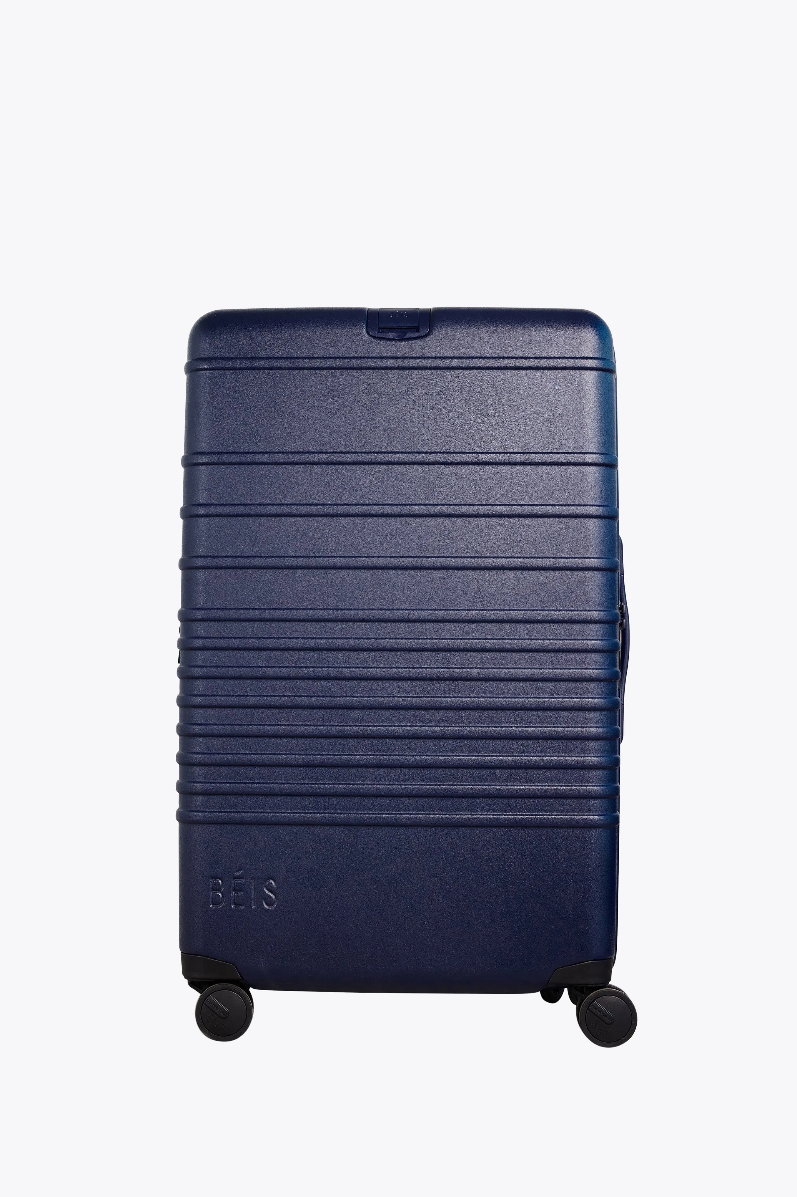 The Large Check-In Roller in Navy