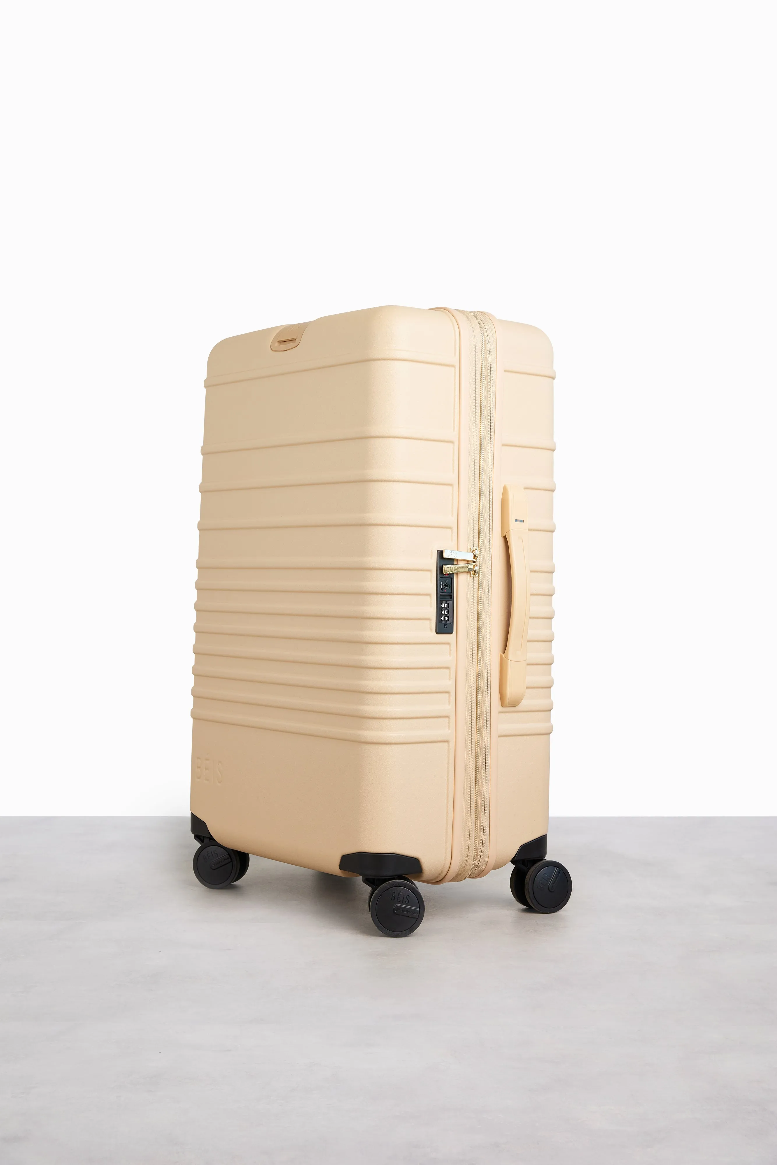 The Medium Check-In Roller in Beige