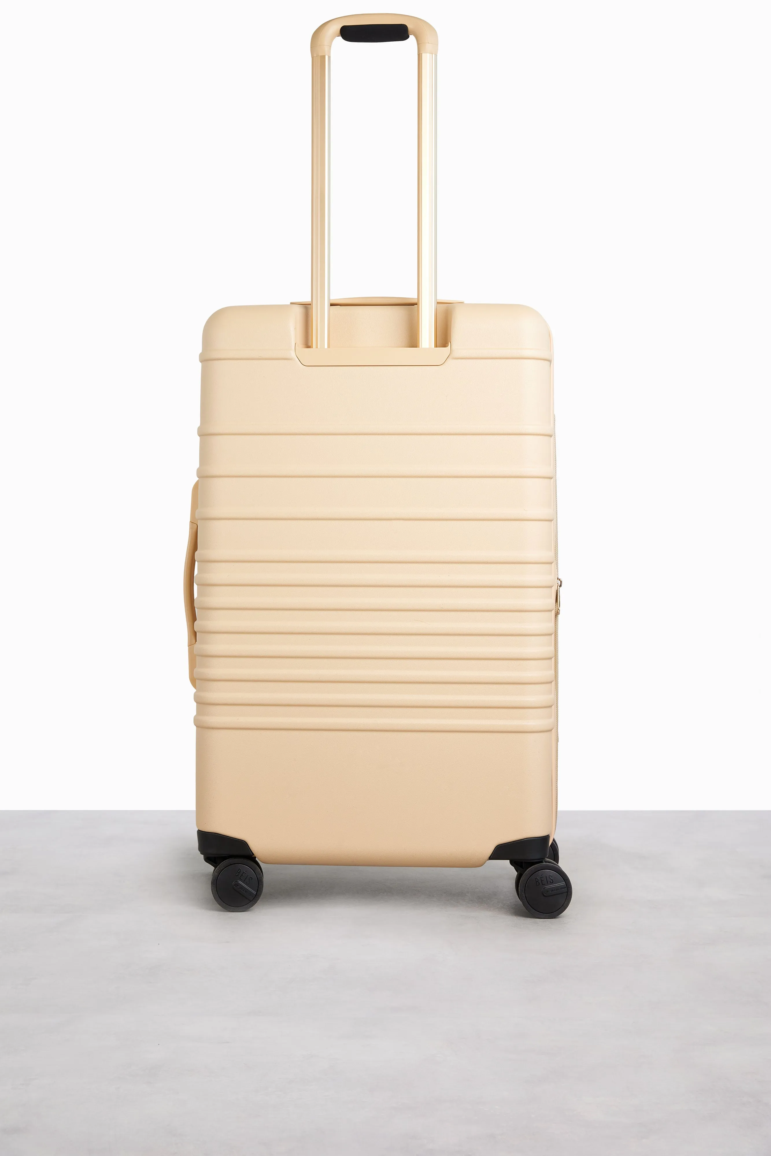 The Medium Check-In Roller in Beige